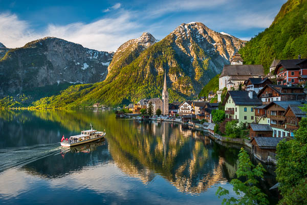 Famous mountain village Hallstatt in Austria on a sunny morning by Michael Abid