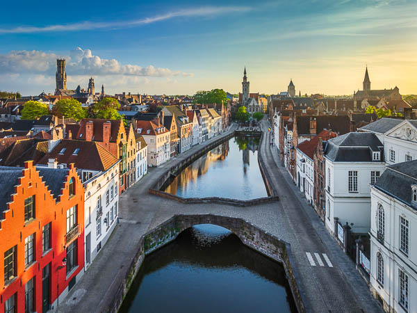 Aerial view of the historic city of Bruges, Belgium at sunset by Michael Abid