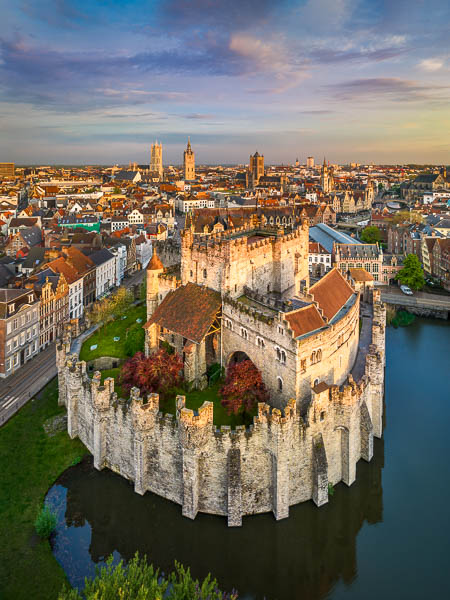 Castle Gravensteen with the old town in the background, Ghent, Belgium by Michael Abid