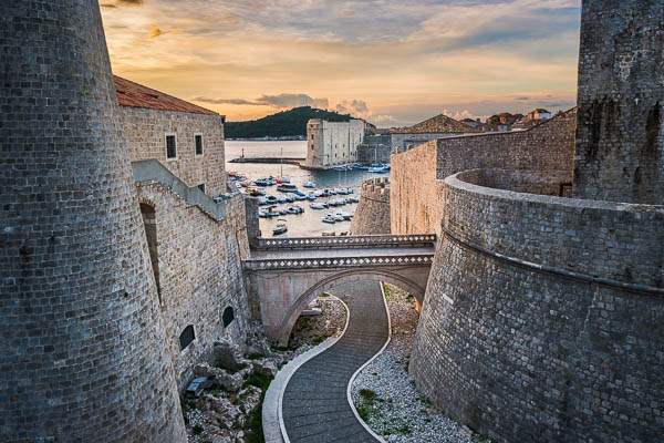 Old town of Dubrovnik, Croatia with a path leading towards the harbor by Michael Abid