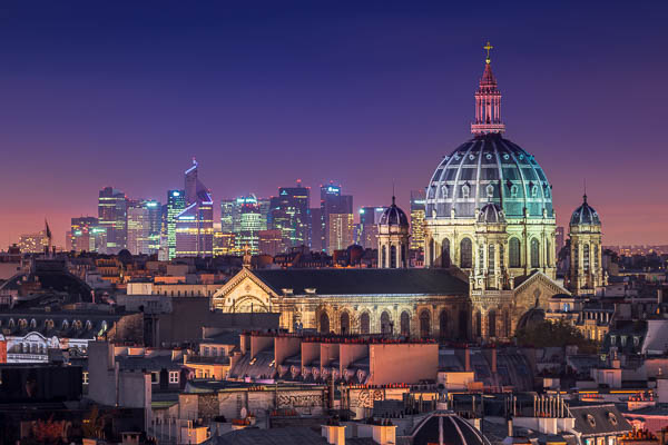 Skyline of historic Paris, France with modern La Defense buildings in the background by Michael Abid