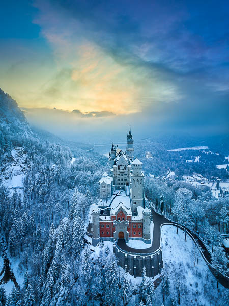 The famous Neuschwanstein Castle on a winter evening, Germany by Michael Abid