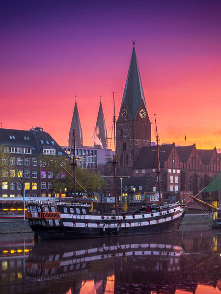 Schlachte in Bremen, Germany at sunrise with the "Admiral Nelson" ship on Weser river. by Michael Abid