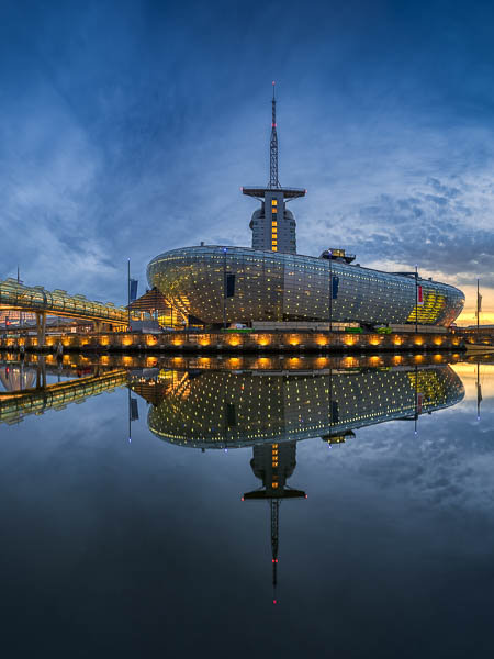 Klimahaus in Bremerhaven, Germany at night with a reflection by Michael Abid