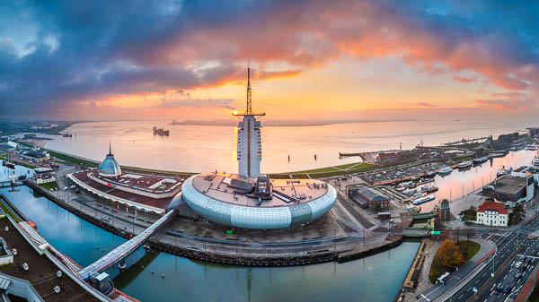 Panoramic view of the New Harbour (Neuer Hafen) and the Klimahaus in Bremerhaven, Germany at sunset by Michael Abid
