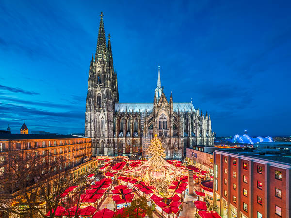 Christmas market in front of the Cathedral in Cologne, Germany by Michael Abid