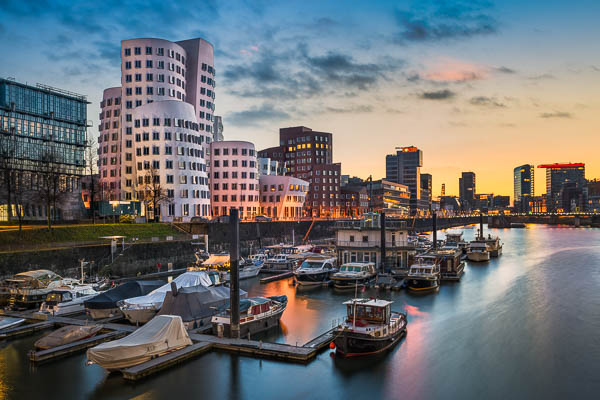 Medienhafen harbour skyline in Dusseldorf, Germany at sunset by Michael Abid