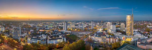 Panoramic aerial view of the night skyline of Essen, Germany by Michael Abid