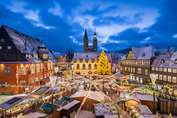 Christmas market on the market square in Goslar, Germany by Michael Abid