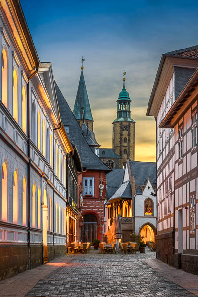 Old town of Goslar, Germany at night with a view of church towers by Michael Abid