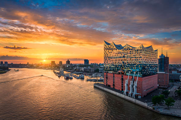Elbphilharmonie building in Hamburg, Germany during a colorful sunset by Michael Abid