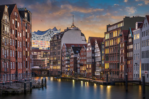 Nikolaifleet and Elbphilharmonie in Hamburg, Germany during sunset by Michael Abid