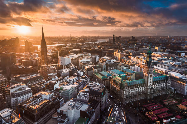 Aerial view of the skyline of Hamburg, Germany during sunset by Michael Abid
