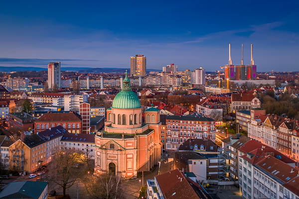 Skyline of Hannover, Germany with St. Clemens Basilica in foreground by Michael Abid