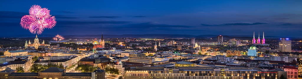 Skyline of Hannover at night with fireworks