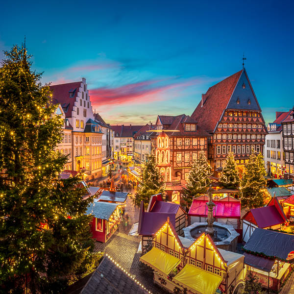 Christmas market at the historic market square in Hildesheim, Germany by Michael Abid
