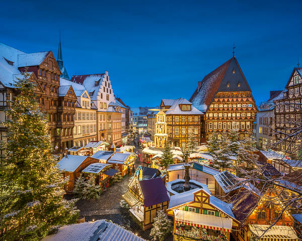 Christmas market at the historic market square in Hildesheim, Germany by Michael Abid