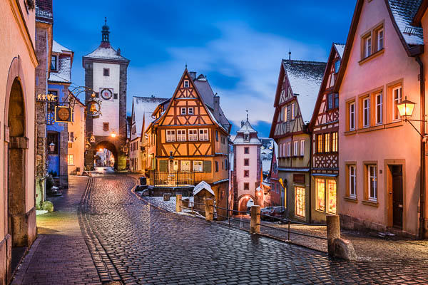 Medieval town of Rothenburg ob der Tauber, Germany on a winter night by Michael Abid