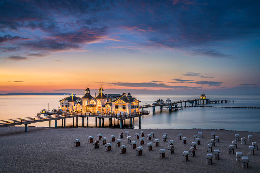 Wandbild bei Sonnenuntergang Seebrücke Sellin |