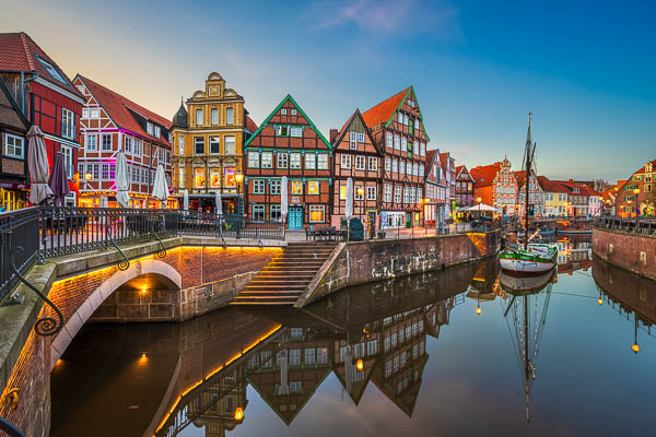 Historic harbor in Stade, Germany during sunset by Michael Abid