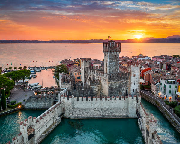 Scaliger Castle in Sirmione, Lake Garda, Italy during sunset by Michael Abid