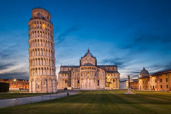 Cathedral and Leaning Tower of Pisa, Italy at night by Michael Abid