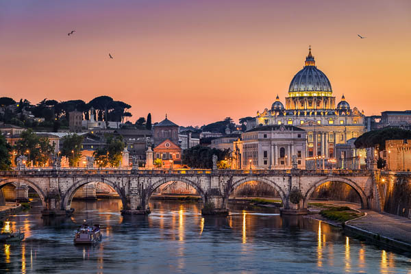 Sunset view of the Basilica St Peter and the Tiber river in Rome, Italy by Michael Abid