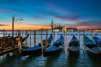 Gondolas at sunrise in Venice