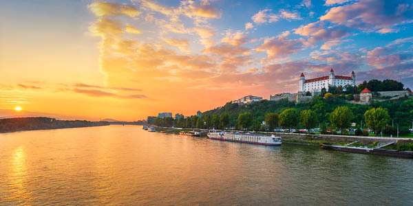 Panorama view of Danube river and Bratislava castle at sunset, Slovakia by Michael Abid