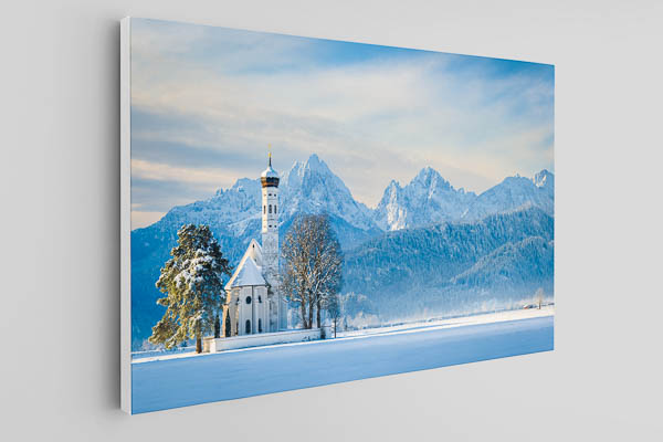 Canvas | St. Coloman church and Alps in Bavaria during winter