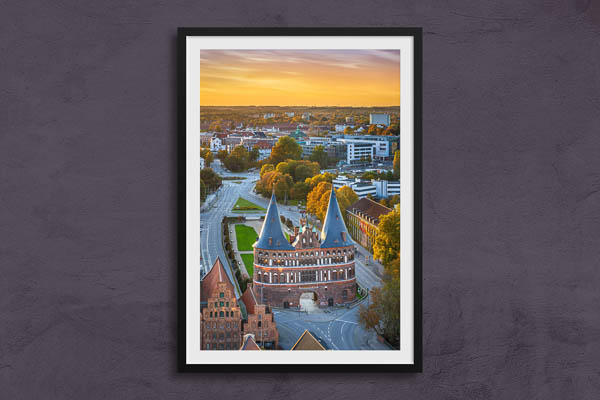 Fine Art Print | Holstentor in Lübeck during autumn sunset