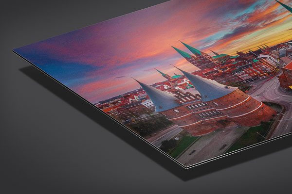 Alu-Dibond | Sonnenaufgang am Holstentor in Lübeck